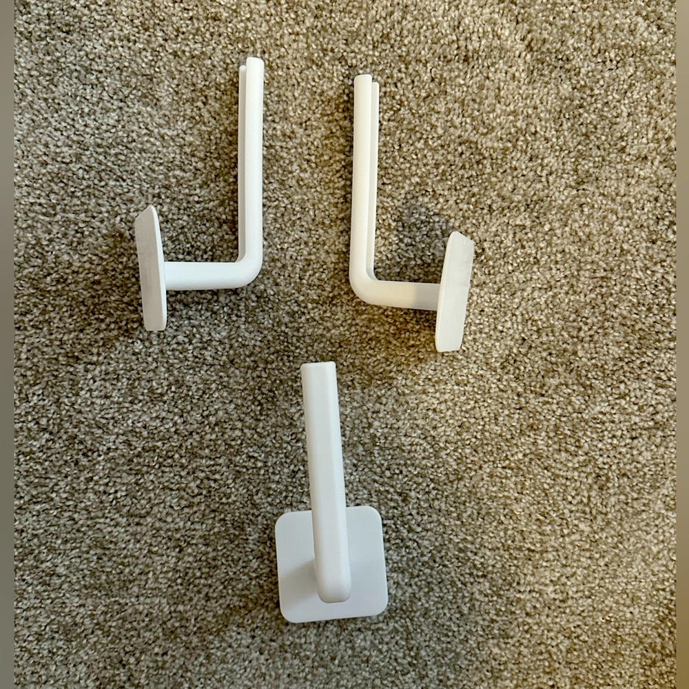 Hat hooks with peel and stick adhesive